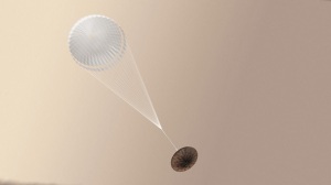Jusque là, tout allait bien. Illustration de Schiaparelli en cours de descente vers Mars, avec son parachute déployé. Copyright ESA/ATG medialab